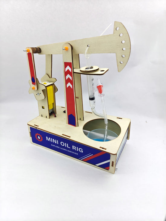 Mini Oil Rig pumpjack close-up — gear drive and pump arm mechanism detail